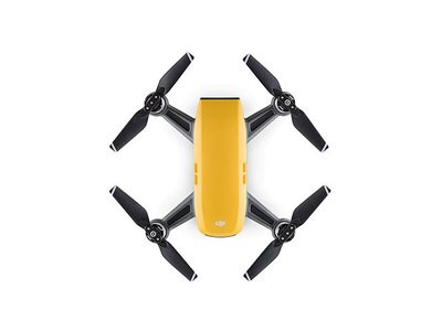 Mini drone quadricoptère Spark de DJI avec caméra 1080p et un manette bonus – jaune lever du soleil 